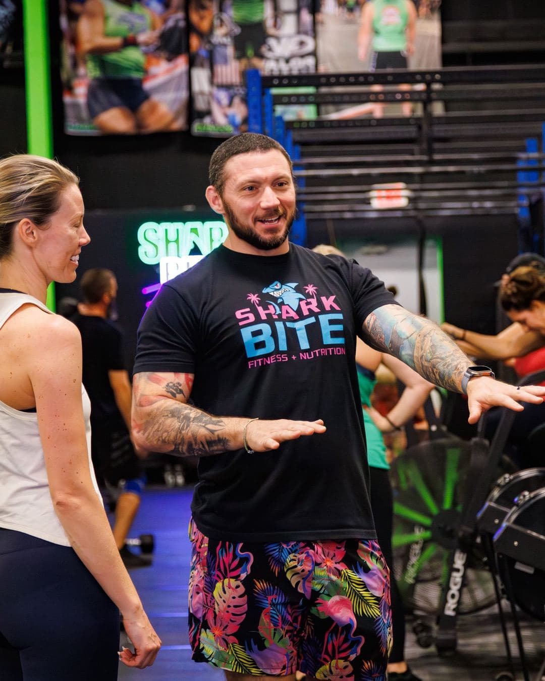 Nick coaching a member on the gym floor at Shark Bite Fitness